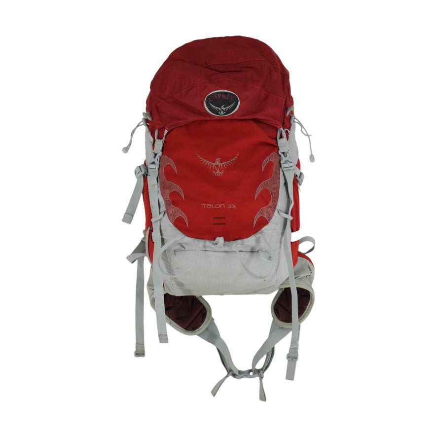 An Osprey Toulon 32 hiking backpack in red and light gray, shown from the front against a plain white background.