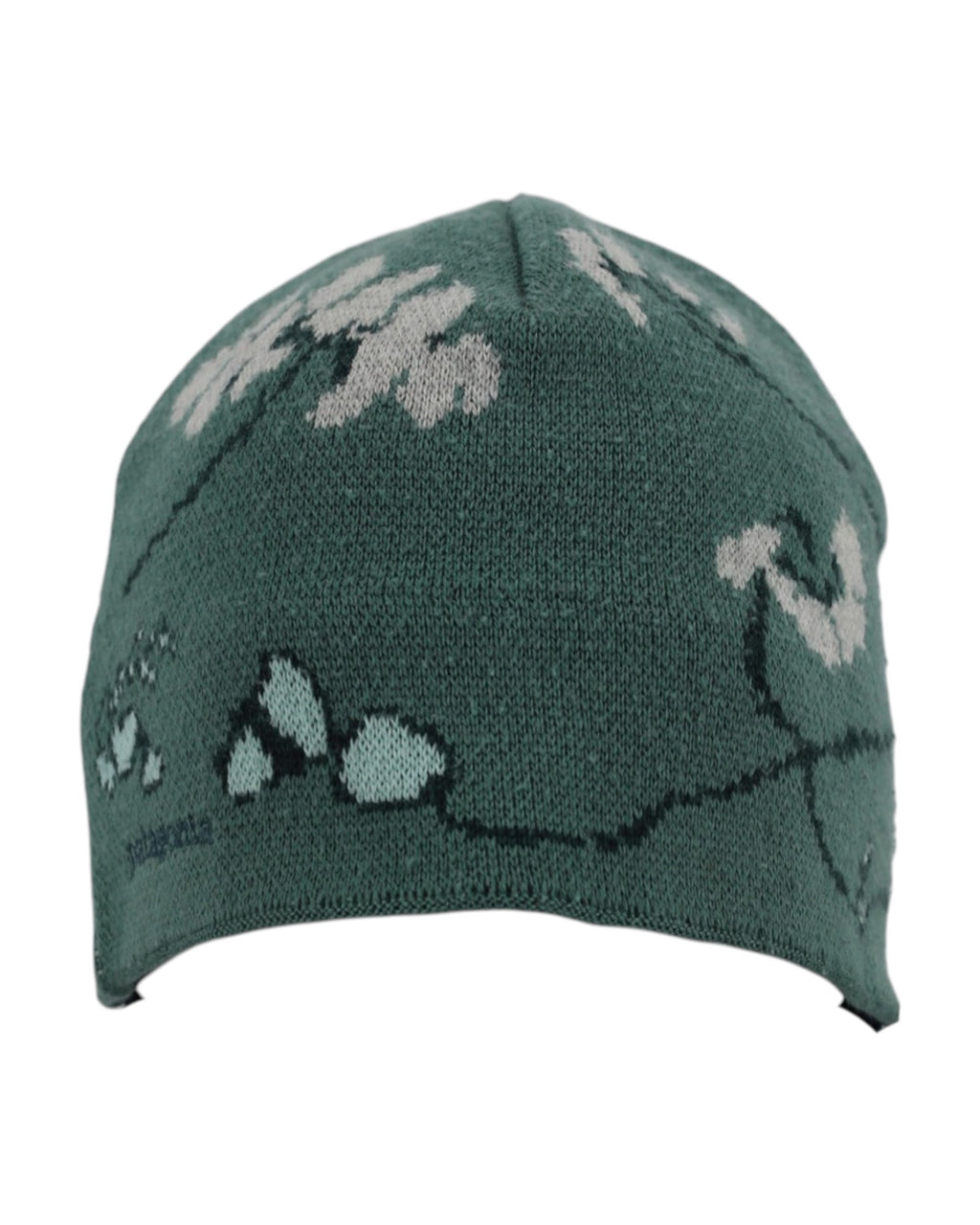 Green knit beanie with white floral patterns on a white background