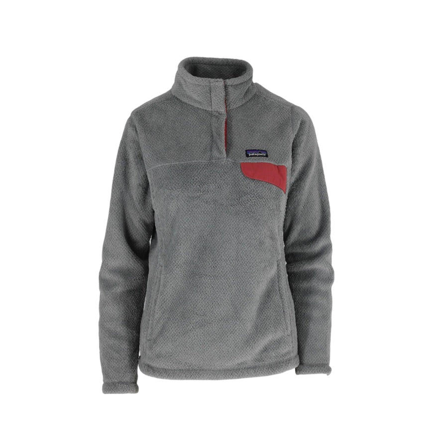 A gray fleece pullover jacket with a quarter-zip collar, featuring a red chest panel and a small Patagonia logo patch on the left chest, set against a plain white background.